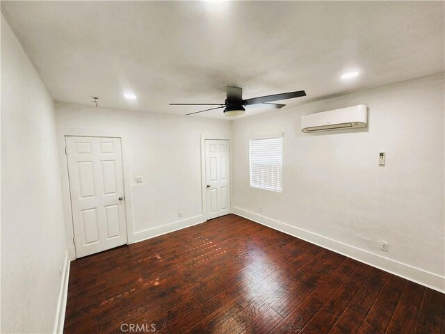 1210 W Manchester Ave, Los Angeles, CA 90044 - spare room with an AC wall unit, ceiling fan, baseboards, hardwood / wood-style floors, and recessed lighting