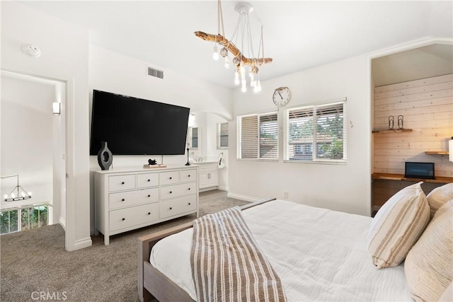 9 Via Olorosa, Rancho Santa Margarita, CA 92688 - carpeted bedroom with a chandelier and ensuite bath