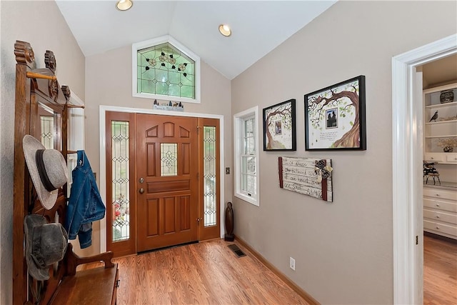 26349 Walnut Hills Dr, Lake Arrowhead, CA 92391 - entrance foyer with light wood finished floors, vaulted ceiling, and baseboards