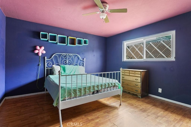 6072 Navajo Rd, Westminster, CA 92683 - bedroom with wood finished floors and ceiling fan