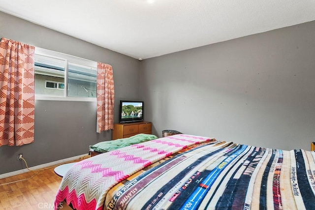 6072 Navajo Rd, Westminster, CA 92683 - bedroom with wood finished floors and baseboards