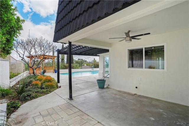 view of patio / terrace featuring a pergola, ceiling fan, and fence