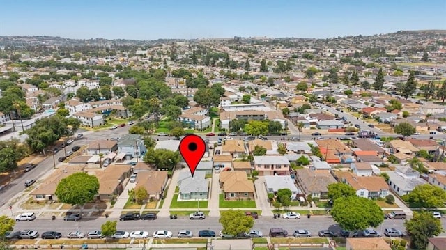 aerial overview of property's location with nearby suburban area