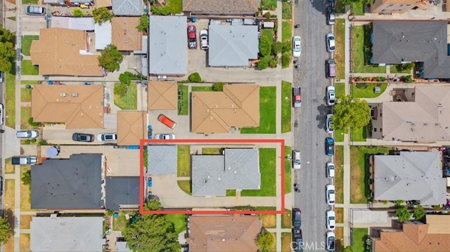 aerial view of residential area featuring property boundaries highlighted
