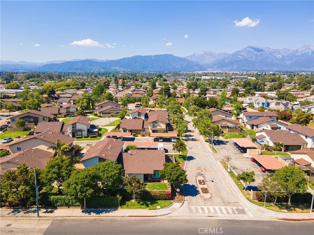 aerial perspective of suburban area with a mountain backdrop