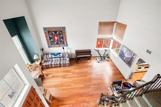 39680 Glenwood Ct, Murrieta, CA 92563 - living area with a towering ceiling and wood finished floors