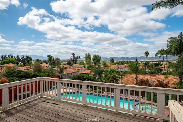 39680 Glenwood Ct, Murrieta, CA 92563 - deck with a residential view, a pool with connected hot tub, and a mountain view