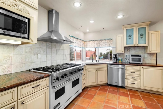 39680 Glenwood Ct, Murrieta, CA 92563 - kitchen with appliances with stainless steel finishes, cream cabinetry, extractor fan, a sink, and recessed lighting