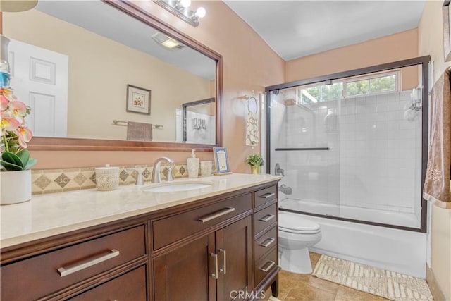 17027 Simonds St, Granada Hills, CA 91344 - full bathroom featuring toilet, vanity, enclosed tub / shower combo, and tile patterned floors