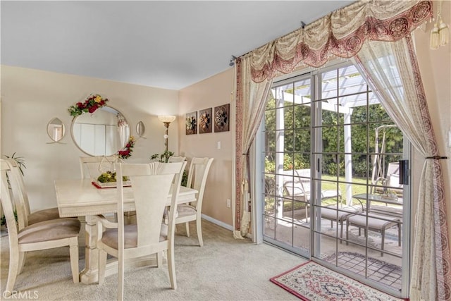 17027 Simonds St, Granada Hills, CA 91344 - dining room featuring light carpet and baseboards