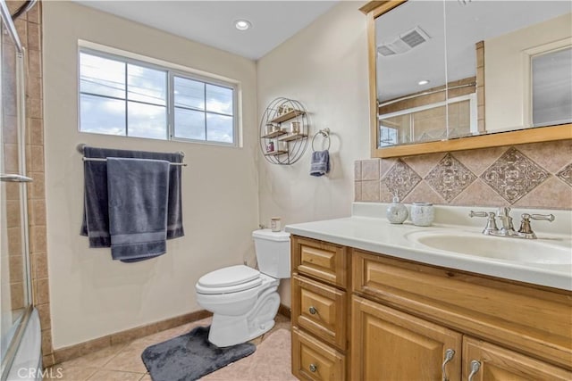 17027 Simonds St, Granada Hills, CA 91344 - full bath featuring toilet, decorative backsplash, vanity, tile patterned floors, and baseboards