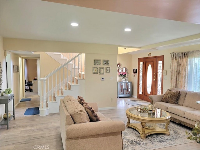 17027 Simonds St, Granada Hills, CA 91344 - living room with stairs, light wood-style floors, baseboards, and recessed lighting