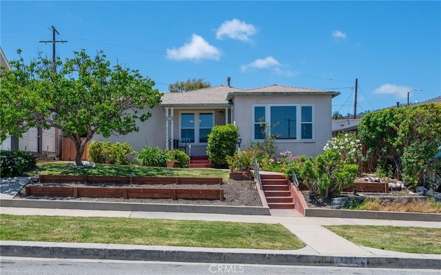 1315 S Walker Ave, San Pedro, CA 90731 - view of front of home with a garden and stucco siding