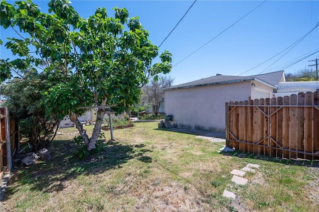 1315 S Walker Ave, San Pedro, CA 90731 - view of yard with an attached garage