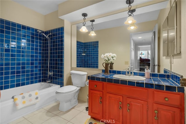 254 E Fern Ave Unit 108, Redlands, CA 92373 - bathroom featuring tile patterned flooring, washtub / shower combination, toilet, and vanity