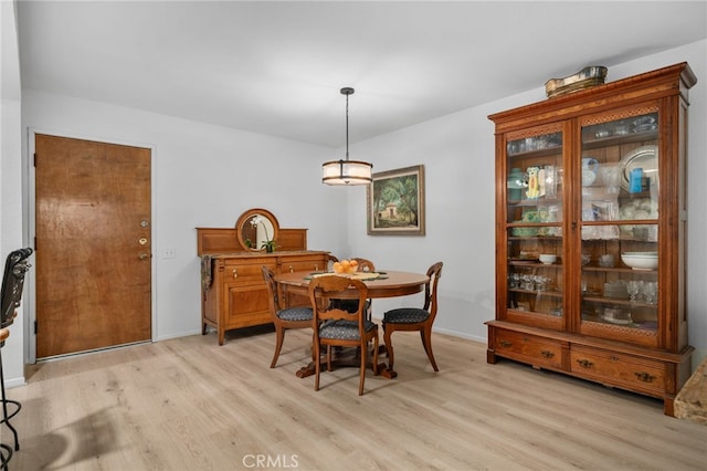 254 E Fern Ave Unit 108, Redlands, CA 92373 - dining room featuring light wood finished floors and baseboards