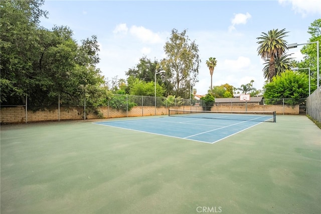 254 E Fern Ave Unit 108, Redlands, CA 92373 - view of tennis court featuring community basketball court and fence