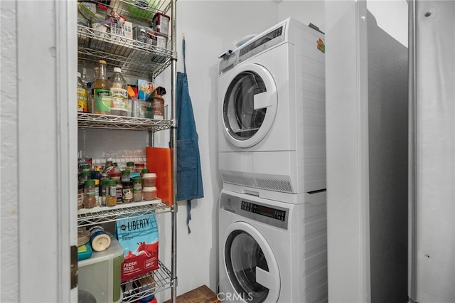 254 E Fern Ave Unit 108, Redlands, CA 92373 - clothes washing area with stacked washer and clothes dryer