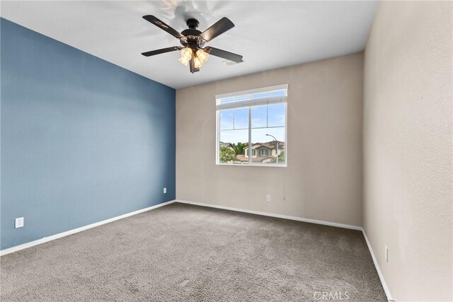 29221 Loden Cir, Menifee, CA 92584 - empty room with carpet flooring, ceiling fan, and baseboards