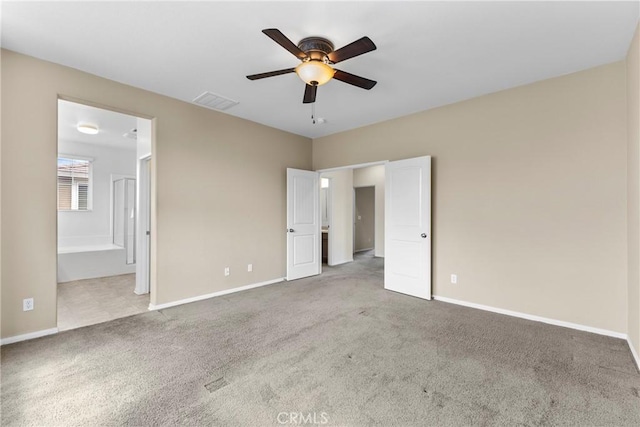 29221 Loden Cir, Menifee, CA 92584 - unfurnished bedroom featuring baseboards, carpet, and ensuite bath