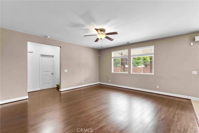 29221 Loden Cir, Menifee, CA 92584 - empty room with ceiling fan, wood finished floors, and baseboards