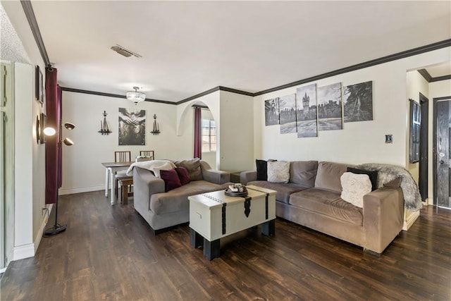 7045 Varna Ave, North Hollywood, CA 91605 - living area with ornamental molding, arched walkways, dark wood-style floors, and baseboards