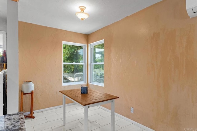 2163 Gracey Ln, Fallbrook, CA 92028 - unfurnished dining area with baseboards and a wall mounted air conditioner