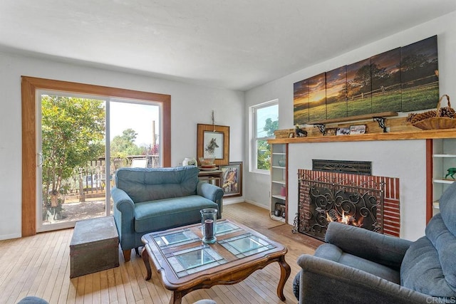 2163 Gracey Ln, Fallbrook, CA 92028 - living area featuring hardwood / wood-style flooring, a fireplace, and baseboards
