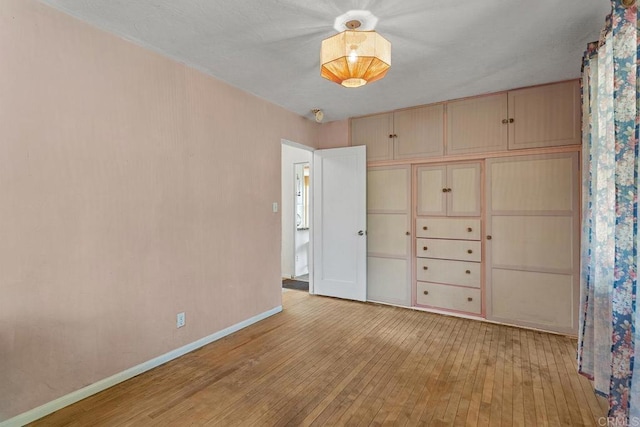 2163 Gracey Ln, Fallbrook, CA 92028 - unfurnished bedroom featuring light wood-style flooring, baseboards, and a closet
