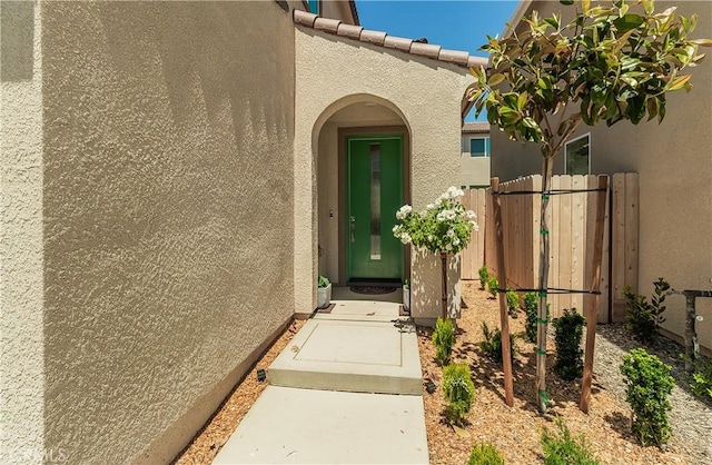 1123 Vanguard Way W, Madera, CA 93636 - entrance to property featuring stucco siding and fence
