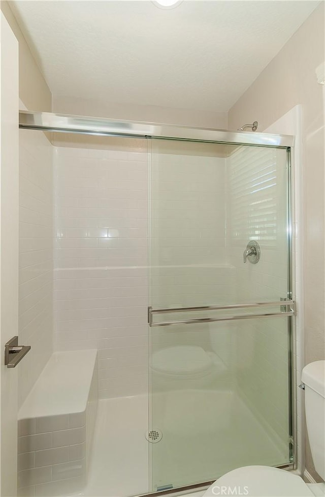 1123 Vanguard Way W, Madera, CA 93636 - full bath featuring toilet and a shower stall