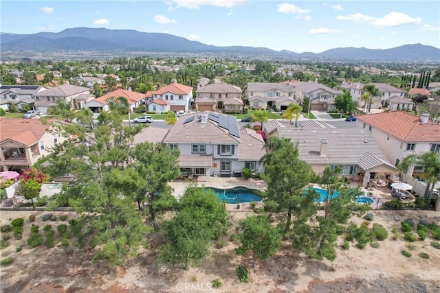 32840 Northshire Cir, Temecula, CA 92592 - aerial perspective of suburban area with a pool and a mountainous background