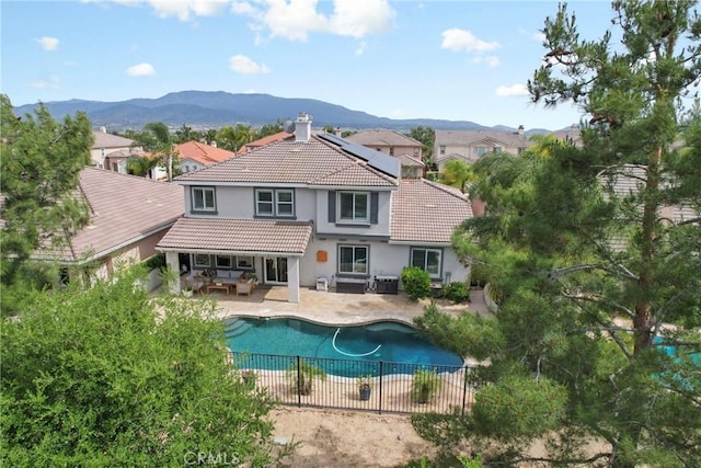 32840 Northshire Cir, Temecula, CA 92592 - view of swimming pool with an outdoor living space, a patio area, and a mountain view