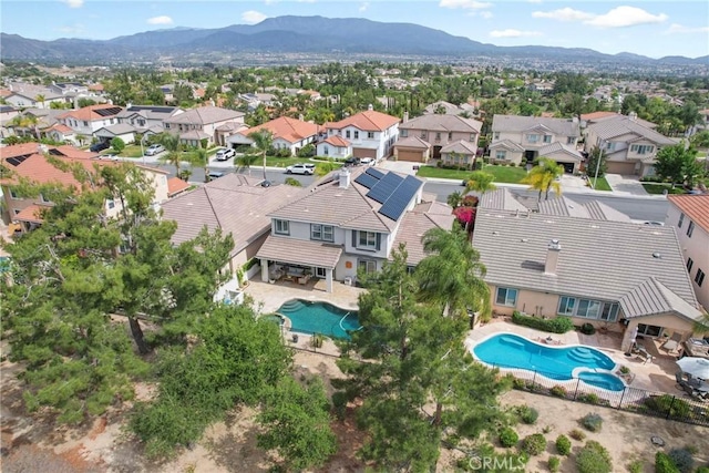 32840 Northshire Cir, Temecula, CA 92592 - aerial perspective of suburban area with a pool area and mountains