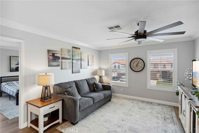 32840 Northshire Cir, Temecula, CA 92592 - living room featuring ornamental molding, ceiling fan, and light wood-style floors
