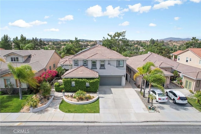 32840 Northshire Cir, Temecula, CA 92592 - mediterranean / spanish home with concrete driveway, a residential view, an attached garage, stucco siding, and a tile roof
