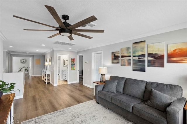 32840 Northshire Cir, Temecula, CA 92592 - living room with ornamental molding, a ceiling fan, recessed lighting, and wood finished floors
