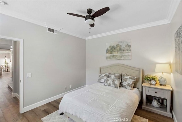 32840 Northshire Cir, Temecula, CA 92592 - bedroom with ornamental molding, wood finished floors, and ceiling fan