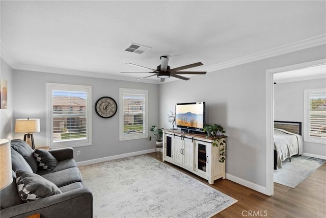 32840 Northshire Cir, Temecula, CA 92592 - living area with ornamental molding, healthy amount of natural light, wood finished floors, and a ceiling fan