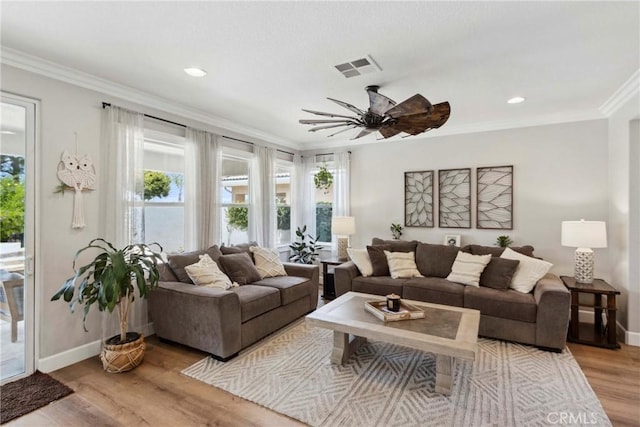 32840 Northshire Cir, Temecula, CA 92592 - living room featuring crown molding, light wood-style flooring, ceiling fan, and recessed lighting