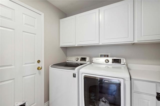 32840 Northshire Cir, Temecula, CA 92592 - washroom with cabinet space and washer and dryer