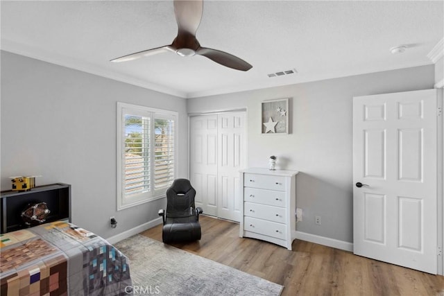 32840 Northshire Cir, Temecula, CA 92592 - bedroom with ornamental molding, wood finished floors, a closet, and ceiling fan