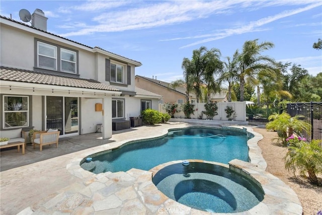 32840 Northshire Cir, Temecula, CA 92592 - view of swimming pool with a patio area, a fenced backyard, and a pool with connected hot tub