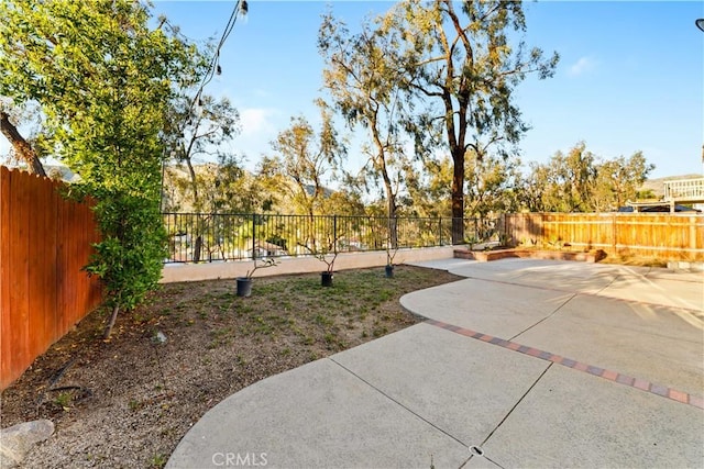 23770 Waterleaf Cir, Moreno Valley, CA 92557 - fenced backyard featuring a patio area