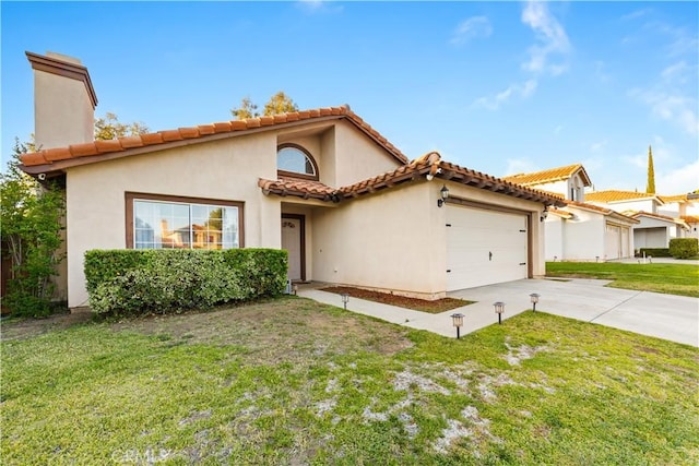 23770 Waterleaf Cir, Moreno Valley, CA 92557 - mediterranean / spanish-style house with an attached garage, a front lawn, driveway, stucco siding, and a tile roof