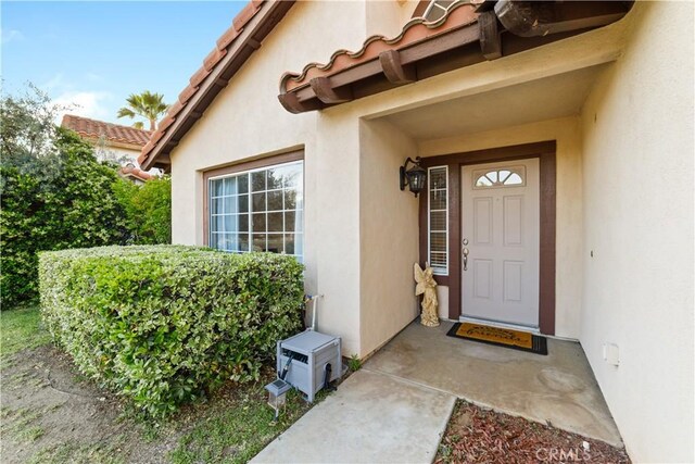 23770 Waterleaf Cir, Moreno Valley, CA 92557 - entrance to property featuring stucco siding