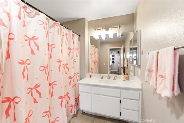 23770 Waterleaf Cir, Moreno Valley, CA 92557 - full bath with vanity, tile patterned floors, and a shower with shower curtain