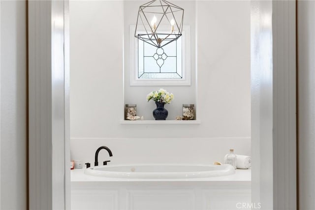 2583 N Skytop Ct, Orange, CA 92867 - full bath featuring a chandelier and a bath