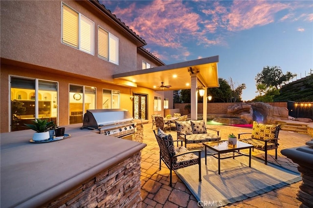 2583 N Skytop Ct, Orange, CA 92867 - view of patio with area for grilling, grilling area, an outdoor living space, and a ceiling fan