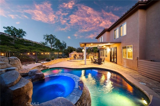 2583 N Skytop Ct, Orange, CA 92867 - view of pool with fence, a patio area, a pool with connected hot tub, and ceiling fan